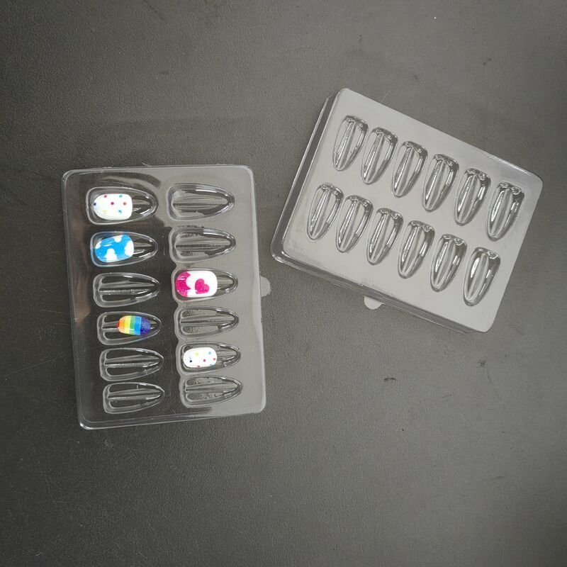 Customized melon seed shaped 12 grid PET transparent vacuum formed Nail Tip storage display tray